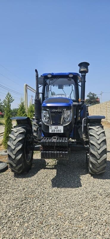 куплю трактор мтз 82 или 80 чуй: Lovol markalı bu mavi traktor kənd təsərrüfatı işləri üçün uyğundur — 1