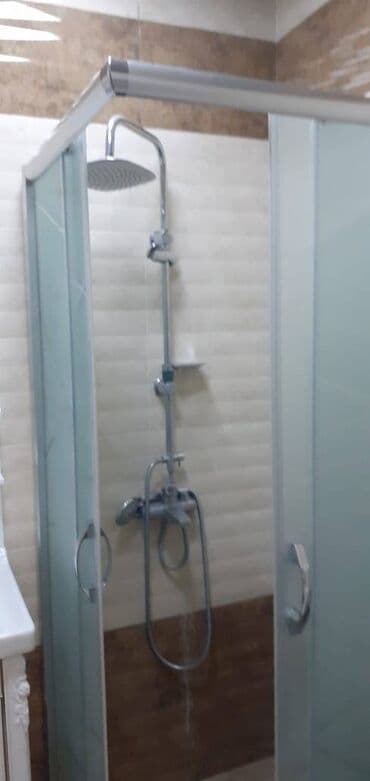 tam temirli menziller: İnşaatçılar metrosunun çıxısında inşaat binasında 12 mertebeli — 16