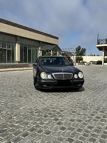 teker 16: Mercedes-Benz E-Class: 2.2 l | 1999 il Sedan — 3