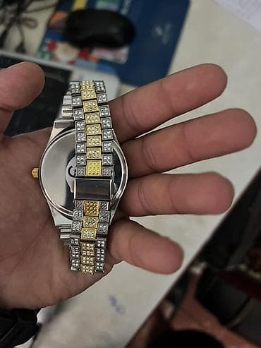 saatlar 2020: Qol saatı – iki rəngli (gümüşü və qızılı) metal qolbağlı, daşlı model — 2