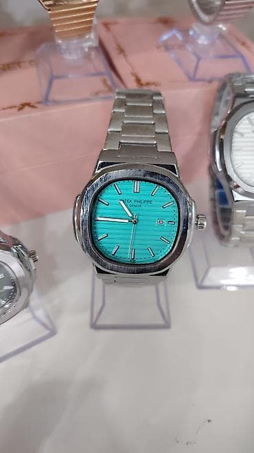 elektrikli saat: Patek Philippe tərzində analoq qol saatları – klassik Nautilus dizaynı — 2