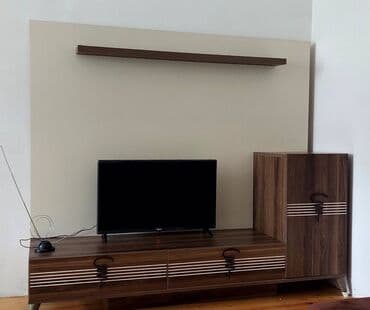 İdeal vəziyyətdə TV stend satılır. Evdə əlava yer tutduğu üçün