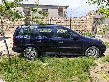 ford focus rs: Opel Astra Caravan (universał) – tünd mavi rəng, 5 qapı, geniş baqajlı — 1