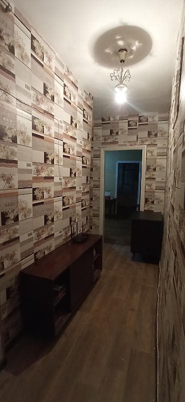 Bakıxanov qəsəbəsi köhnə Dvoreslə üzbəüz (icraya yaxın)parka baxan