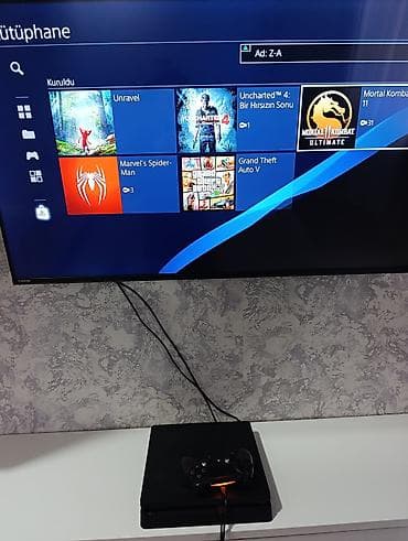 oyun konsoli: PS4 slim 500gb zavod plombu üzərində, ideal vəziyətdə 2pult +10 oyun — 7