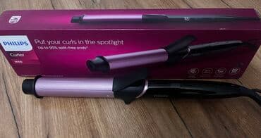 filips: Philips saç burğusu – geniş silindrli, tutacaq klipsli model. Rəngi — 2