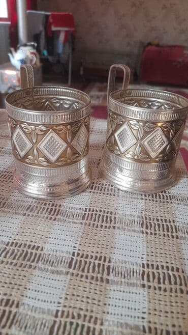 ikinci əl ev əşyaları sumqayıt: İki ədəd metal stəkanaltı (podstakannik) dəsti. Xüsusiyyətlər: - — 1