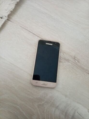 Техника для кухни: Samsung Galaxy J1 Duos, 2 ГБ, цвет - Золотой, Две SIM карты — 1