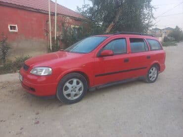 oturacaq uzlukleri: Model: Opel Astra Caravan (Universal kuzov) Rəng: qırmızı Kuzov: 5 — 1