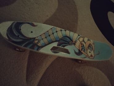 Balıq qrafikası ilə bəzədilmiş bu skeýtboard həm funksional, həm də