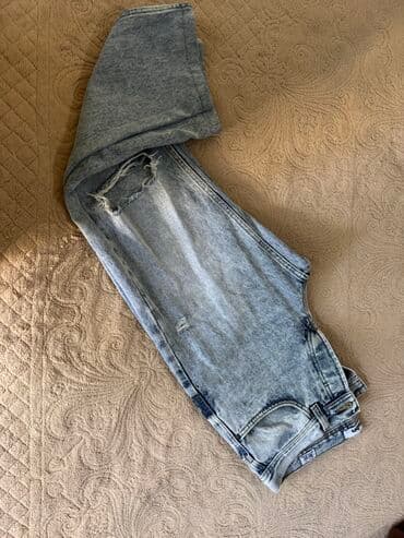 qaqa şalvarı: Boz-açıq yuyulmuş (acid wash) effektli cins şalvar. - Model — 2