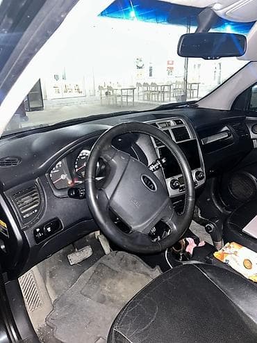 opel astra kompressor: Kia Sportage: 2 l | 2007 il Krossover — 5