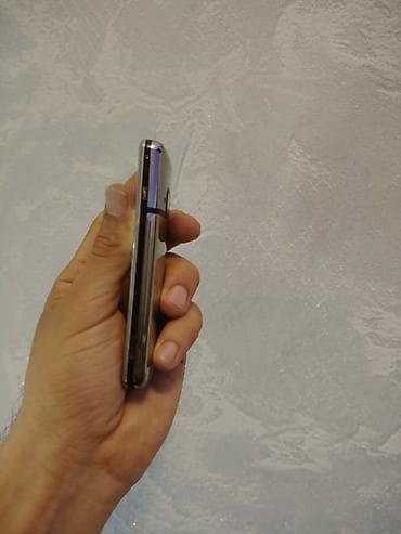 playsation 3: Nokia 8000 4G, 512 GB, rəng - Gümüşü, Düyməli, Barmaq izi, İki sim kartlı — 10