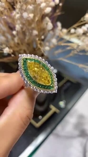 Zərif dizaynlı iri üzük - Mərkəzdə marquise (göz) formalı iri sarı