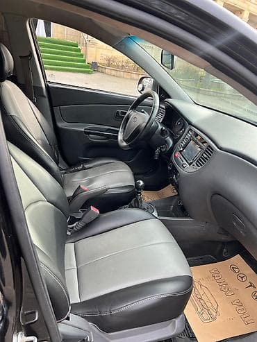 опель зафира а: Kia Rio: 1.4 л | 2011 г. Седан — 10