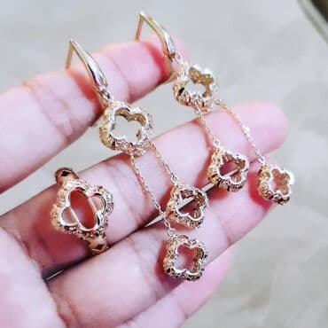 750 əyar qızılın alış qiyməti: Dəstə daxildir: Üzük, Sırğa, Sarı qızıl, 585 Əyar, 811 g — 1