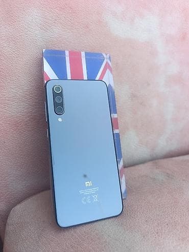 mi 14 pro: Xiaomi Mi 9 SE, rəng - Boz, 
 Barmaq izi — 1