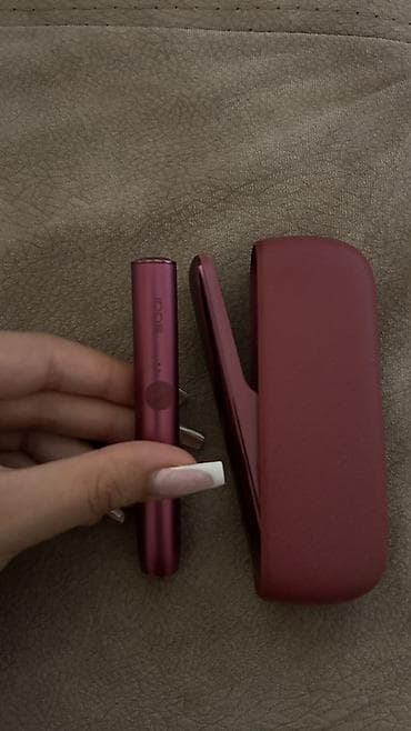 IQOS cihazı və şarj qutusu – tünd narıncı/şərab tonunda — 1