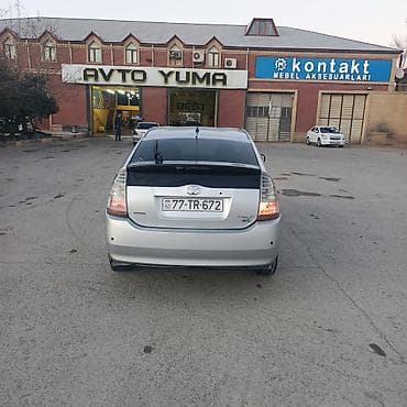ucuz afdamabil: Toyota Prius (2-ci nəsil) hibrid hetçbek – gümüşü rəng. Xüsusiyyətlər — 4