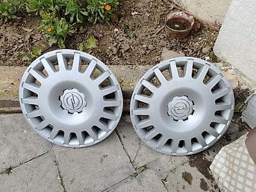 Автозапчасти: Б/у Колпак Opel R 16 — 1