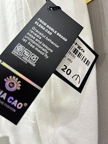 ag papaq: - Rəng: ağ - Model: qısaqol, dairəvi yaxa - Material: yumşaq trikotaj — 3