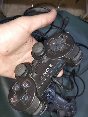 PlayStation 2 (PS2) komplekti - Konsol: Sony PlayStation 2 Slim (üst — 4