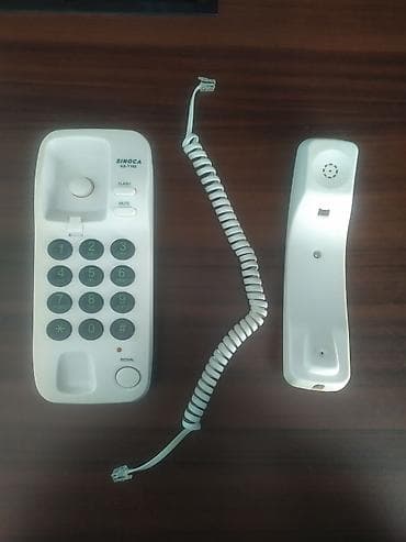 Stasionar telefon Simli, İşlənmiş, Ünvandan götürmə