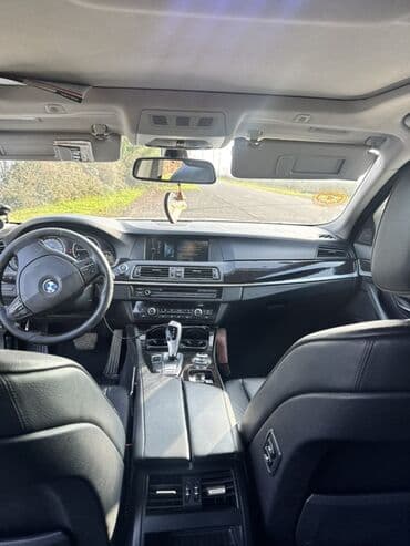 aston martin dbs 6 v12: BMW 5 series: 2 l | 2011 il Sedan — 5