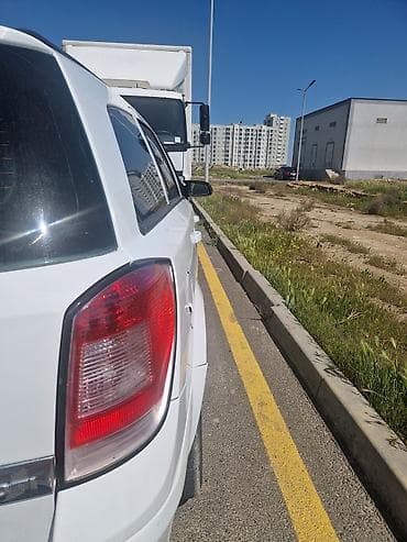 opel astra h rul: Opel Astra H Caravan (Universal), ağ rəng q Xüsusiyyətlər: - Kuzov — 5