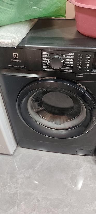 14 plus: Electrolux PerfectCare 600 paltaryuyan maşın (qara rəng) - Ön — 2