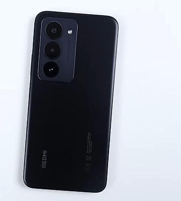 Redmi smartfon - Ekran: Tam ekran dizaynlı, ön kameraya görə mərkəzdə — 1