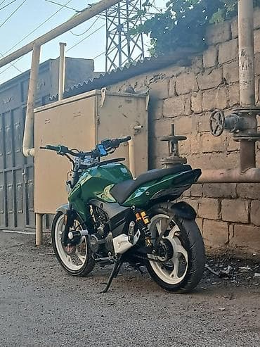 mini cps: Modifikasiya olunmuş şəhər/naked tərzli motosiklet Xüsusiyyətlər: - — 4