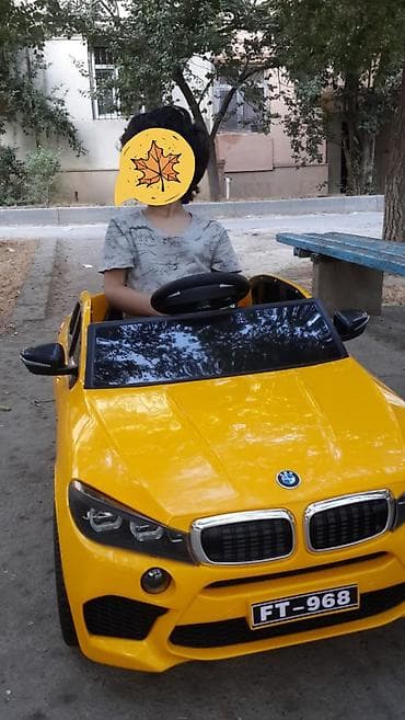 elekt: Uşaq üçün elektrikli minik maşını – sarı rəngdə sport kupe dizaynı — 1