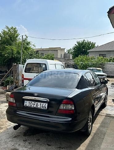 Продажа авто: Daewoo Leganza: 2 л | 1998 г. Седан — 7