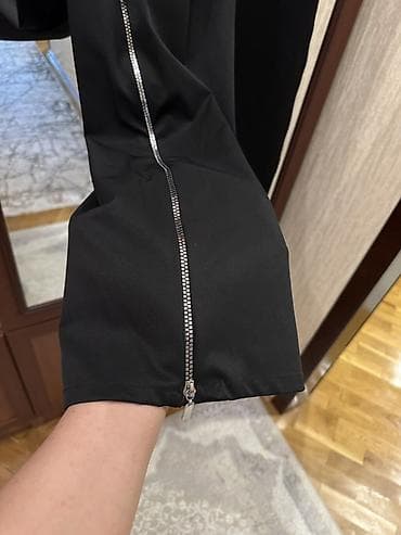 Paltolar: Qara rəngdə geniş kəsimli qadın şalvar. Yan hissələrdə başdan-başa — 4