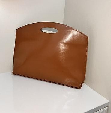 Minimalist üslubda qadın əl çantası - Model: kəsimli tutacaqlı