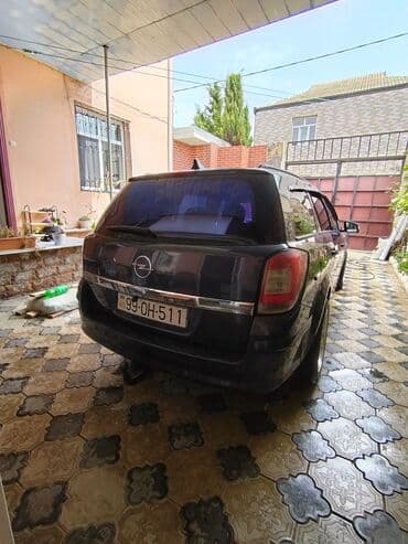 topaş maşın: Opel Astra: 1.6 l | 2006 il 651813 km Universal — 4