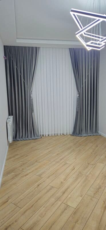 tül parçalar: Ağ rəngli, nazik, şəffaf parçadır. Üzərində həndəsi naxışlar var — 22