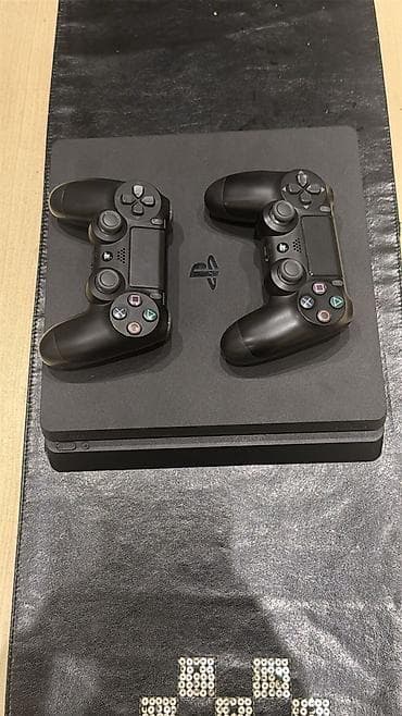 Playstation 4 slim Alinan gunden bizde olub Iki orginal pultu verilir — 1