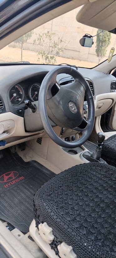 hundai disk: Hyundai Accent: 1.4 l | Sedan — 10