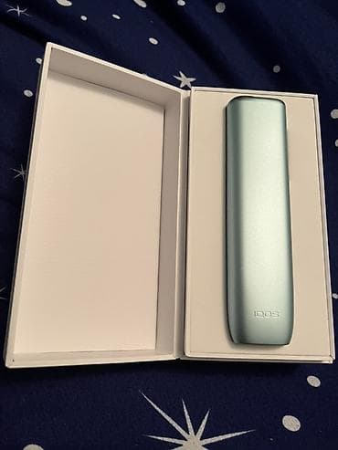 işlənmiş qəlyanlar: IQOS ILUMA (səliqəli açıq mavi rəng) – tütün çubuqları üçün qızdırma — 1