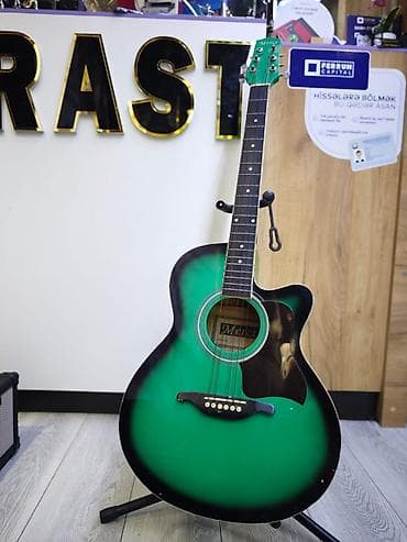 gitara simi: Suvenir gitara Rast musiqi alətləri mağazalar şəbəkəsi 2 ünvanda — 1
