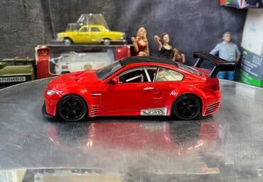 Əntiq saatlar: Коллекционная модель BMW M3 E92 GT2 Red 2009 UNI Fortune Scale 1:32 — 1
