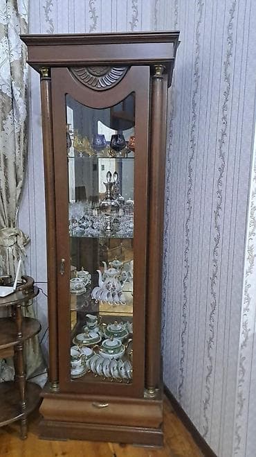 Şüşəli dolab vitrini, İşlənmiş, Ünvandan götürmə