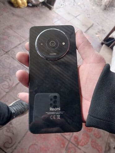 Redmi smartfon Xüsusiyyətlər: - Arxa tərəfdə böyük dairəvi modul ilə