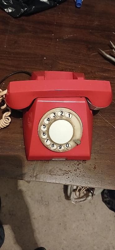 Stasionar telefon Simli