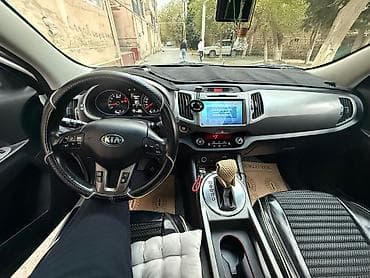 tesla disk: Kia Sportage, ağ rəng, kompakt krossover. Güclü və qənaətcil — 7