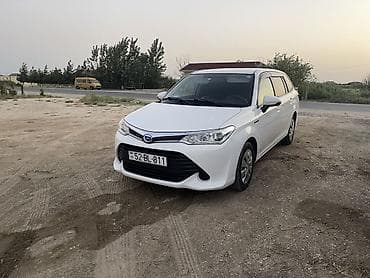 (Toyota) Corolla Fielder Hybrid – ağ rəngli universal kuzov