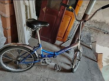 Velosipedlər: Uşaq/yeniyetmə velosipedi — SHIMANO yazılı qatlanan model.Real — 1
