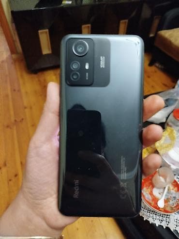 kitay telefonlari: Xiaomi Redmi smartfon - Model: Redmi (arka qapaqda “Redmi” loqosu — 2